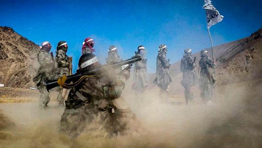 Still image taken from a propaganda video released in 2018 showing Taliban fighters using RPG rockets in a training camp in Faryab Province, Afghanistan. Picture: Handout / Alamy.
