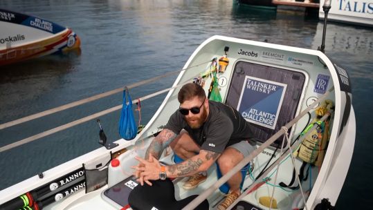 Petty Officer Jon Norfolk on HMS Oardacious in the Talisker Whisky Atlantic Challenge (Picture: Forces News).