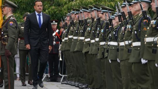Taoiseach Leo Varadkar inspects a Guard of Honour during the rededication of the National Army Monument at Glasnevin Cemetery in Dublin CREDIT Brian Lawless PA Wire.jpg