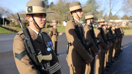 The British Army's newest Gurkhas stand to attention at a passing out parade following the completion of their initial training.