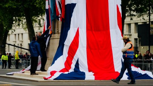 The Cenotaph being draped in Union Jack flags to mark VE Day 80 060525 CREDIT BFBS