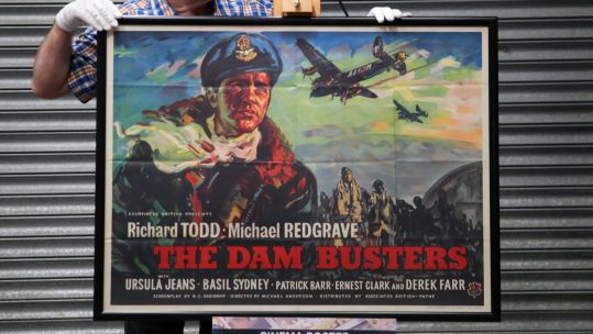 The Dam Busters film poster with Mike Bloomfield behind