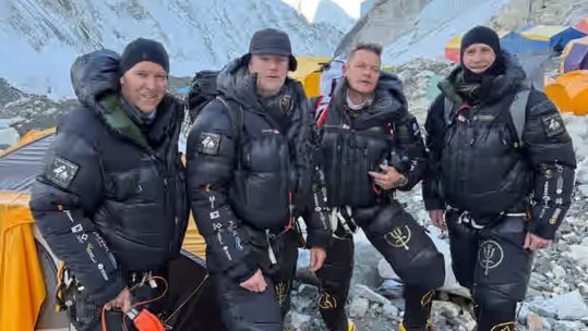 The Everest mission team pictured on their ascent