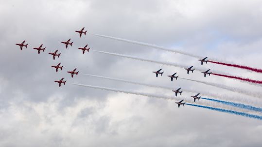 The Red Arrows and La Patrouille de France fly together at the Royal International Air Tattoo 20th July 2019 170620 CREDIT MOD