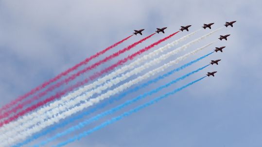 The Red Arrows fly over Belfast as part of a UK-wide flypast to mark VJ Day last year