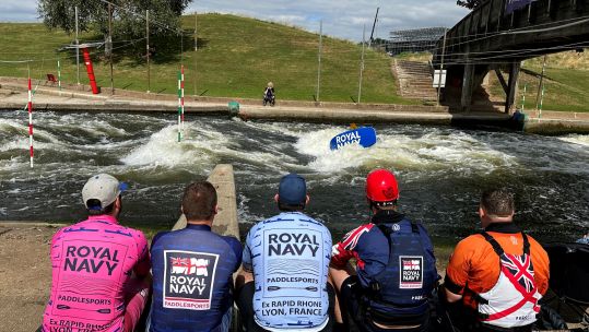 The Royal Navy kayakers watch on as the freestyle event takes place at the IS Championships 210824 CREDIT Royal Navy