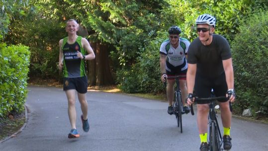 Members of the Running and Cycling teams who transported the flag between stations.