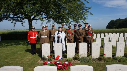 The military party gather at the graveside of Cpl Davies 190619 CREDIT Crown Copyright.JPG