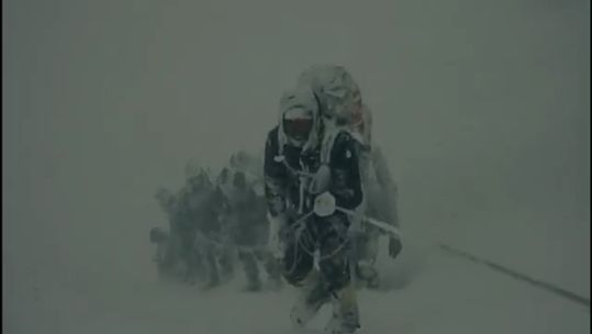 The group huddled down on the snow as the avalanche crashed down Mount Everest's rocks and ice (Picture: Al Carns' X)