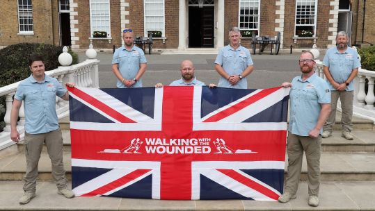 Cover image: Walking With The Wounded's Walk of Oman team pictured in September 2020 (Picture: PA).