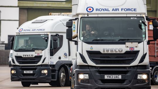 The trucks from 2 (MT) Squadron roll out from RAF Wittering on their way to Marchwood ahead of NATO's Air Policing Mission in Romania