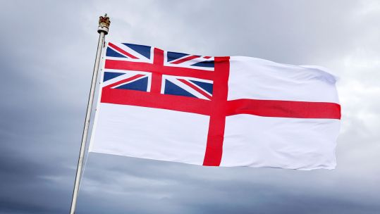 The white ensign flies while HMS Protector is alongside at Rothera, Antarctica December 2021 CREDIT Crown Copyright