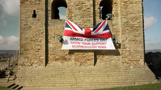 To mark 100 days until 2022 armed forces day, Royal Marines abseiled down Scarborough Castle 17032022 CREDIT BFBS
