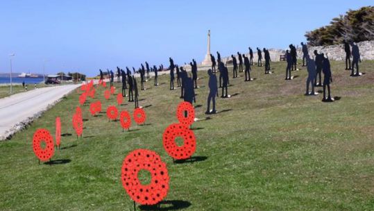 Tommy silhouettes in field of remembrance outside Christ Church Cathedral, Port Stanley, Falkland Islands 031121 CREDIT STANDING WITH GIANTS