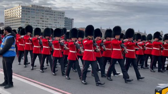 Troops march across Westminster Bridge ahead of Coronation 