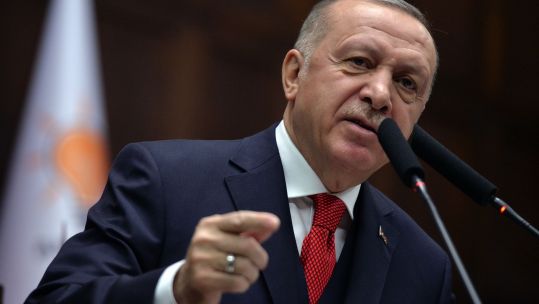 Turkish President Recep Tayyip Erdogan speaks to his party members at the parliament in Ankara 190120 CREDIT PA.jpg