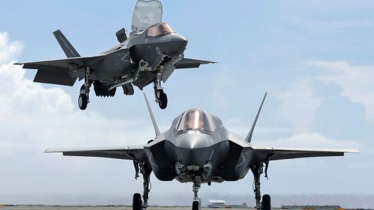 Two F-35Bs landing on the deck of HMS Queen Elizabeth