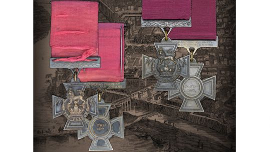 Cover image: The two Victoria Cross medals sold at auction (Picture: Morton & Eden).