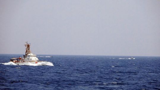 Two Iranian Islamic Revolutionary Guard Corps Navy fast in-shore attack craft conducting unsafe and unprofessional maneuvers while close to USCGC Maui in the Strait of Hormuz 10052021 CREDIT US DEPT OF DEFENSE