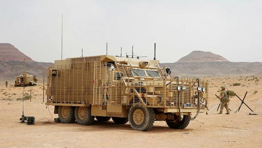 Two heavily armoured 6 wheeled Mastiff Protected Patrol Vehicles from 11 (EOD) Regiment, Royal Logistic Corps