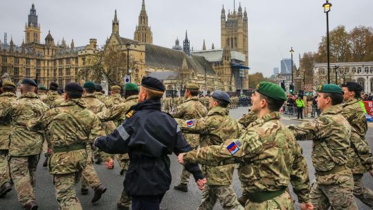 UK personnel parade through Wesminster in honour of Operation Pitting