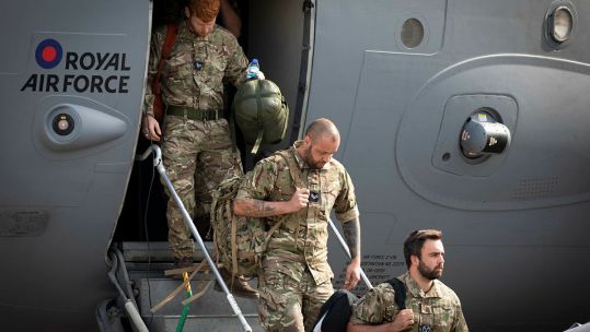 UK personnel step off C-17 at RAF Brize Norton after being part of Op Pitting in Afghanistan