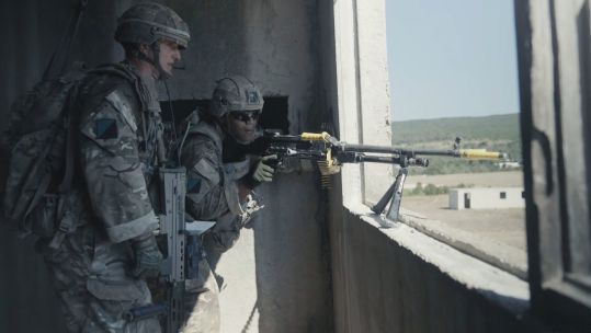 UK troops look down at terrain on Exercise Platinum Lion 22 (Picture: NATO TV).