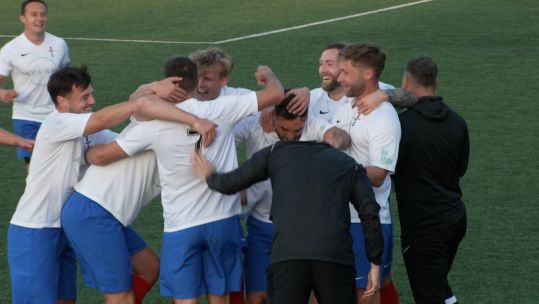 UKAF players hug Joe Spalding after his sensational goal helped them to a 4-1 win over the Irish Defence Forces in Leicestershire 080623 CREDIT BFBS.jpg