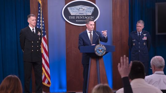 Cover Image: Jonathan Hoffman speaks to reporters at the Pentagon (Picture: US Department of Defense).