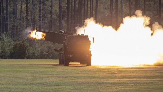 US Marines fire a practice rocket from M142 high mobility artillery rocket system during Exercise Rolling Thunder