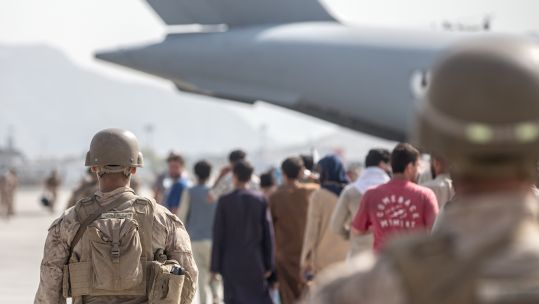 US Marines guide evacuees on to a US Air Force Boeing C-17 Globemaster III during an evacuation at Kabul airport 210821 CREDIT US DEPARTMENT OF DEFENSE_0.jpg