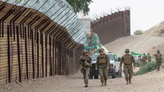US Marines put up barbed wire at the US-Mexico border in California (Picture: US Department of Defense).