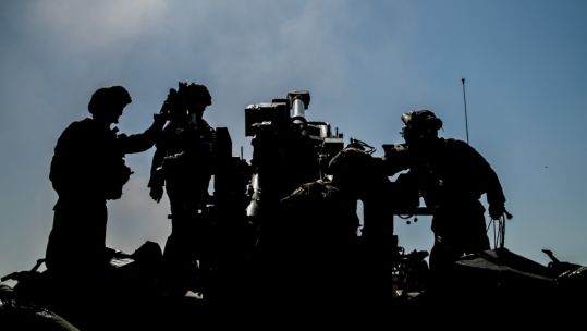 Cover image: American troops in Iraq (Picture: PA).