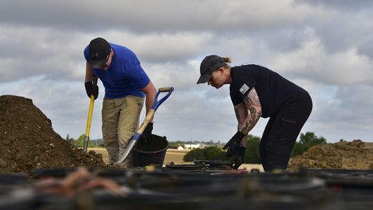 23 members of the US military dug up a farmer's field in Essex to search for the remains (Picture: US Department of Defense).