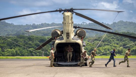 US personnel and partner nations conduct procedures drills with a CH-47F Chinook at the Aeropuerto Internacional Panama Pacifico (Picture: US Department of War)