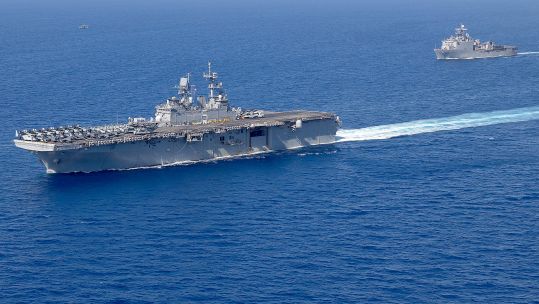 USS Bataan and USS Carter Hall sail on the Mediterranean Sea