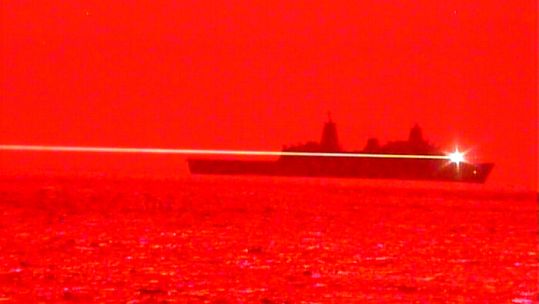 Cover image: USS Portland fires laser (Picture: US Navy).