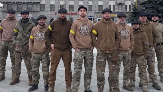 Members of the drone unit show off their newsboy caps and Blinders-themed hoodies (Picture: Yaroslav Chyzhenko)