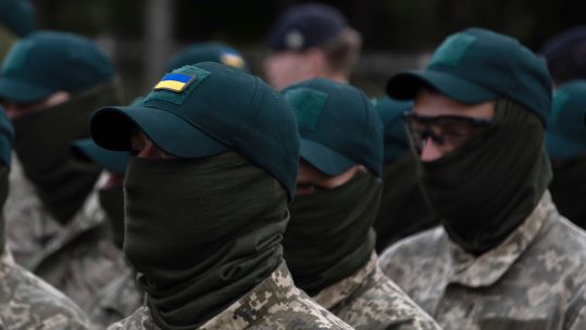 Ukrainian Personnel attending a Field Service to mark the Independence Day of Ukraine