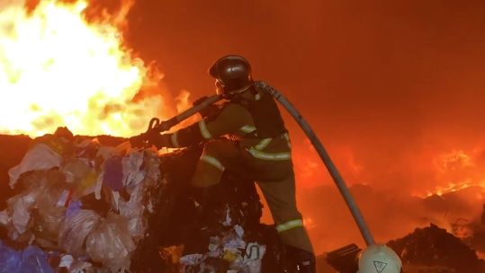 Ukrainian emergency services tackling a fire in Kyiv