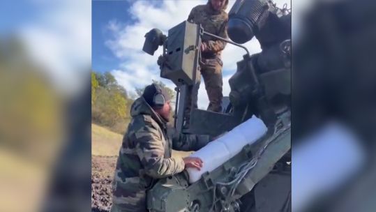 Ukrainian personnel loading cluster munition in Ukraine (Picture: Ukrainian MOD).