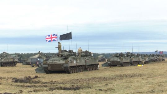 Union Flag flying from a tank on Sennelager Ranges in Germany as I Mercian prepare for a deployment to Estonia 160221 CREDIT BFBS