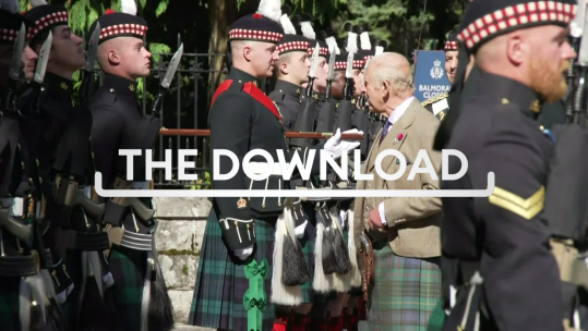 The King inspects his Royal Guard at the gates of Balmoral