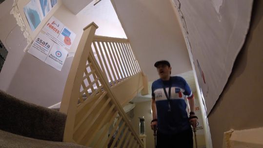 Veteran Ben Wilson climbs home staircase to raise money for charity.