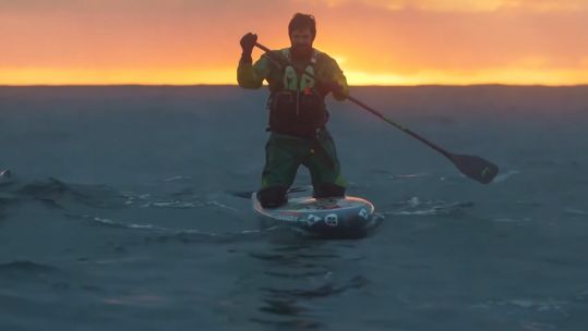 Veteran Jordan Wylie paddle boards (Picture: Alfie Marsh).