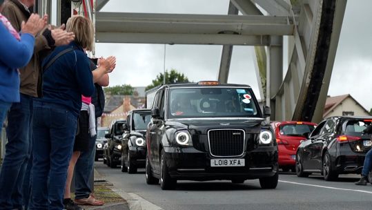 Veterans crossing Pegasus Bridge in black cabs to commemorate D-Day 050624 CREDIT BFBS