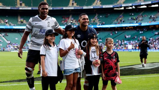 Viliame Mata and Sam Matavesi of Fiji celebrate with family after the Summer Nations Series International match between England and Fiji at Twickenham Stadium  Image ID 2RM1G6D CREDIT Craig Mercer  Alamy Stock Photo
