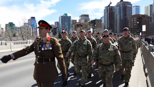 British troops parade with Canadian colleagues in Calgary to commemorate the 100th anniversary of the Battle of Vimy Ridge