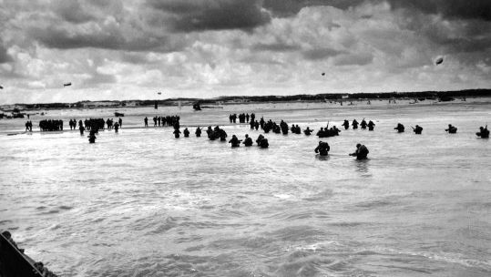U.S. troops wading to Utah Beach during the D-Day invasion of Normandy on June 6-8, 1944.