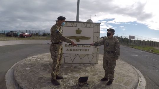 Cover image: WO Dick hands over the Station Warrant Officer role at Akrotiri to WO Finlay.